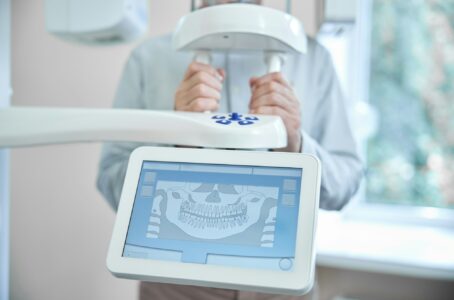 Patient of Richard L. Lachenmayr, D.M.D. in Alpha, NJ, receiving a panoramic digital dental x-ray to enhance diagnostic accuracy and care. 